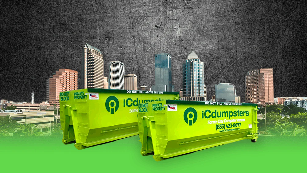Two iCdumpsters same-day roll-off dumpsters against the Tampa skyline