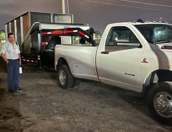 iCdumpsters founder with the first MAXX-D trailer and Ram dually truck