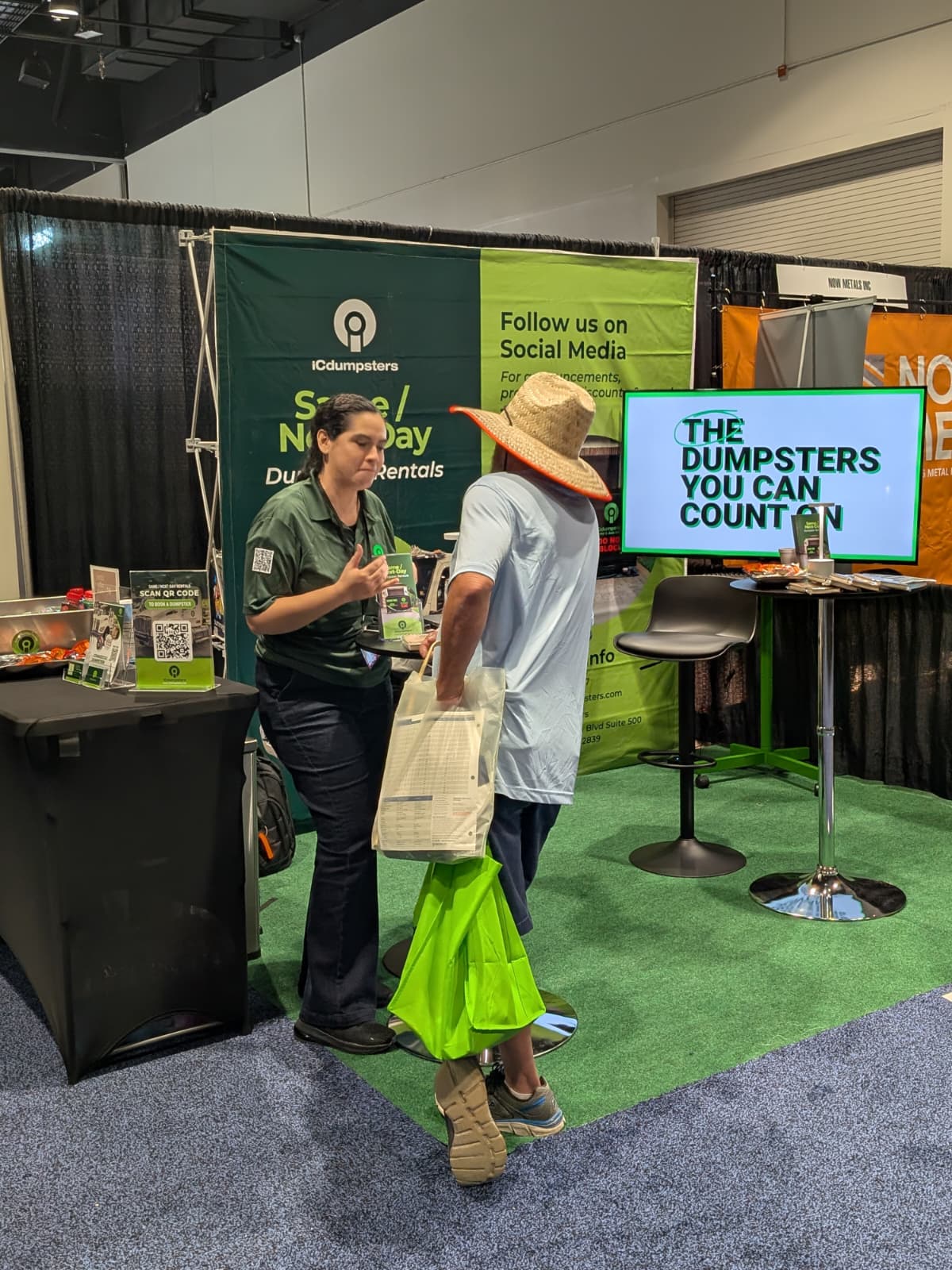Booth conversation with attendee at FRSA 2025